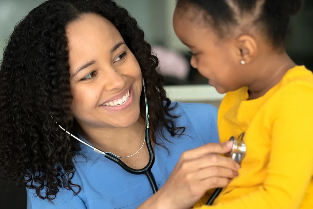 Nurse checking kid